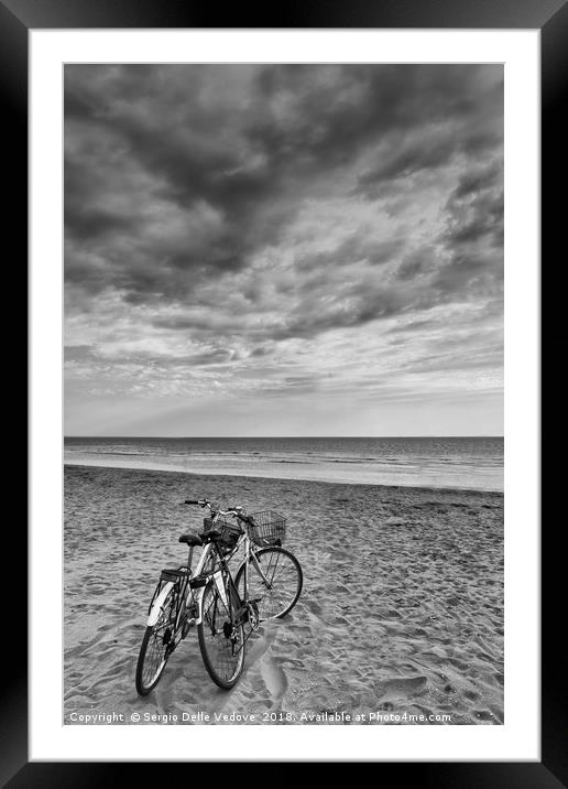 bicycles on the beach Framed Mounted Print by Sergio Delle Vedove