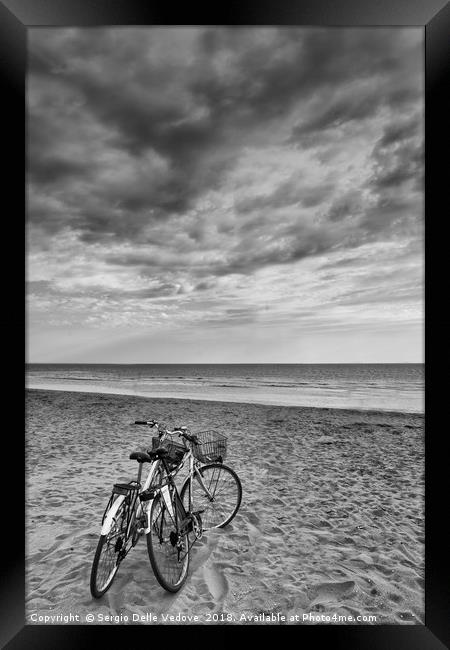 bicycles on the beach Framed Print by Sergio Delle Vedove