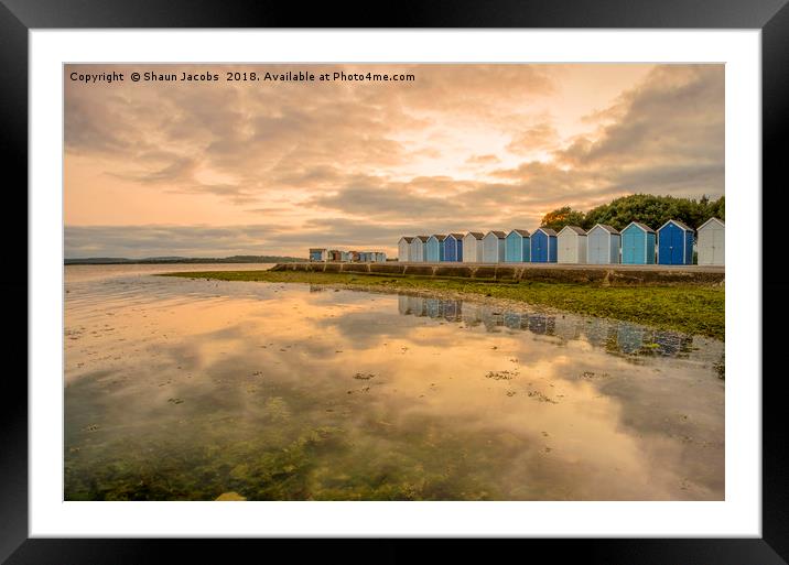 Beach huts reflections  Framed Mounted Print by Shaun Jacobs