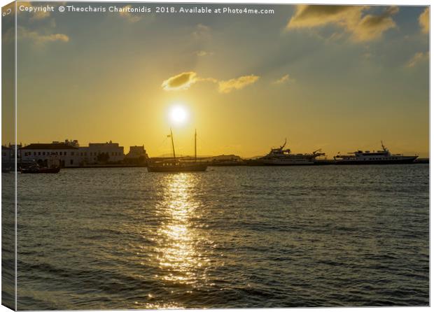 Mykonos Greece golden hour at town waterfront. Canvas Print by Theocharis Charitonidis