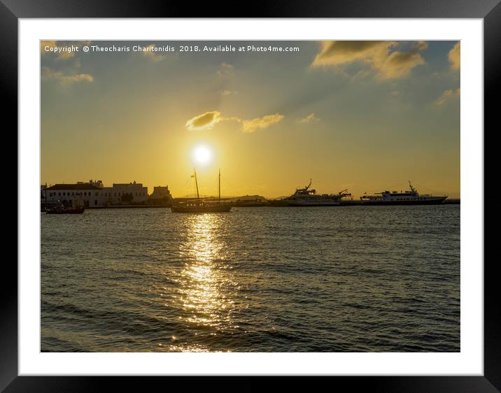 Mykonos Greece golden hour at town waterfront. Framed Mounted Print by Theocharis Charitonidis