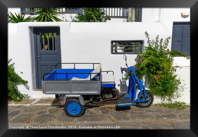 Motor tricycle parked against whitewashed house. Framed Print by Theocharis Charitonidis