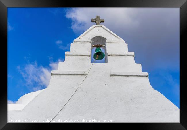 Bell tower at a Greek island against blue sky. Framed Print by Theocharis Charitonidis