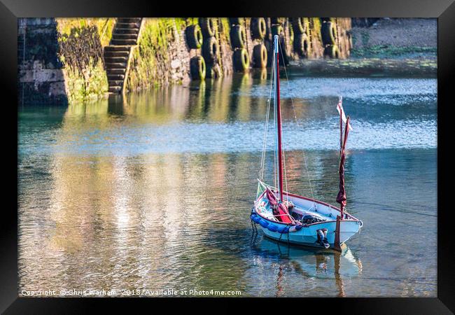 Wooden sailing boat in Mevagissey harbour - Cornwa Framed Print by Chris Warham