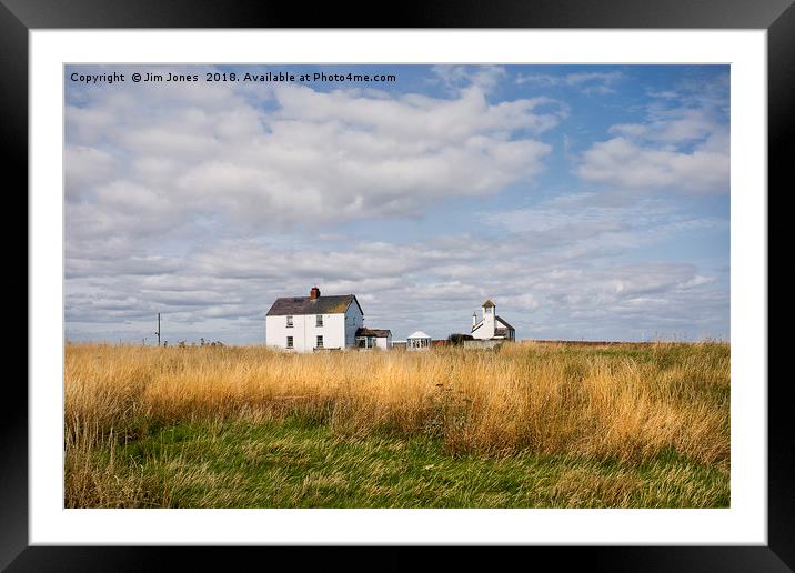 The whitewashed buildings on Rocky Island Framed Mounted Print by Jim Jones