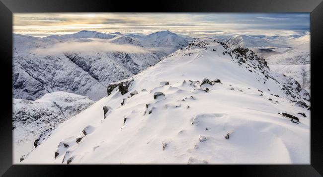 Glencoe mountains in WInter Framed Print by George Robertson