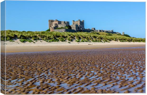 Bamburgh Castle from the Beach Canvas Print by Oxon Images