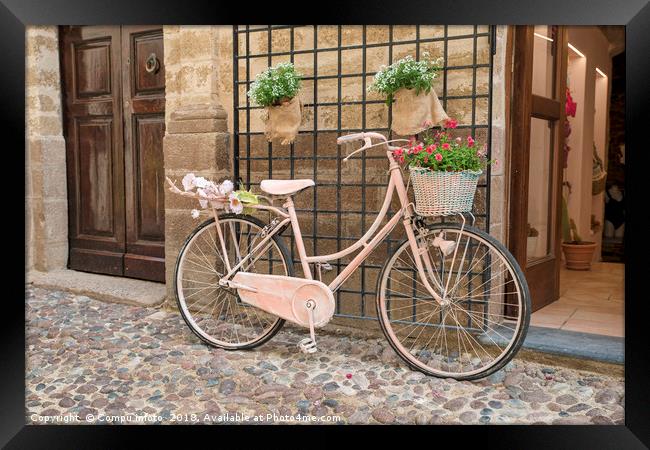 pink painted ladies bike with flowers  Framed Print by Chris Willemsen