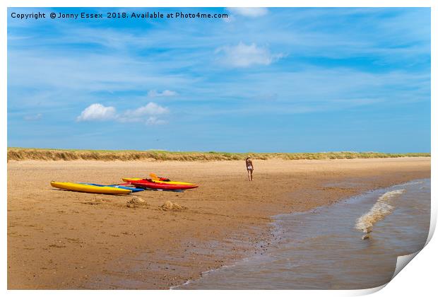A stroll along the beach past some kayaks, canoes Print by Jonny Essex