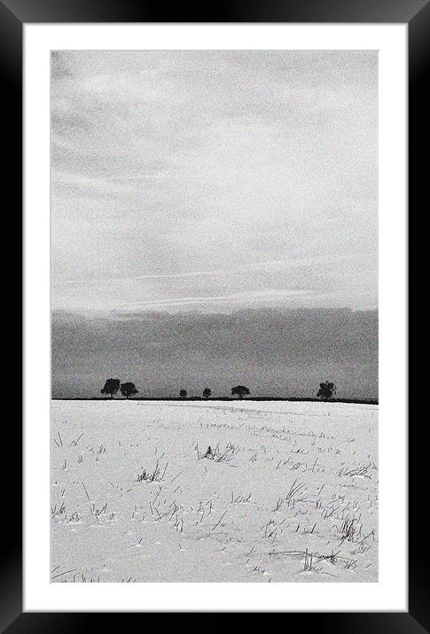 A Snow Covered Field Framed Mounted Print by graham young