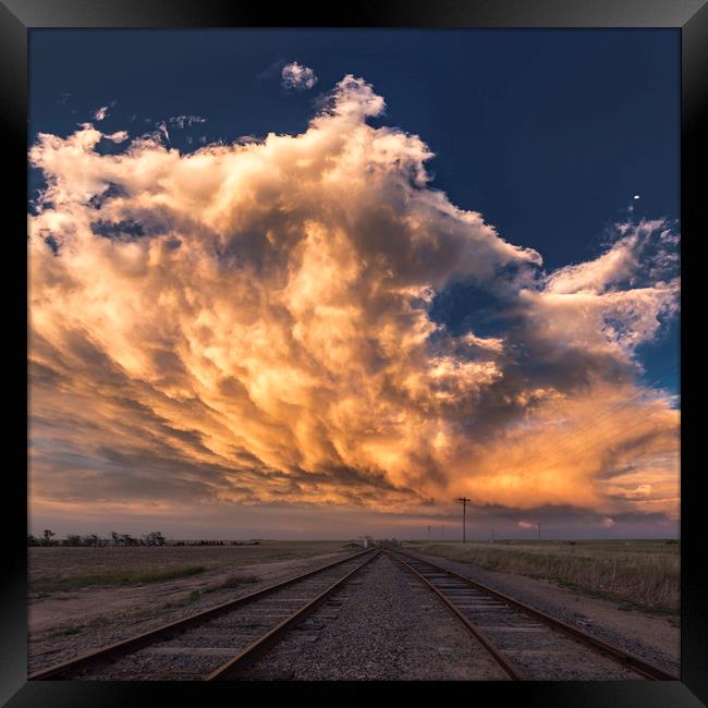 Railroad sunset, Colorado Framed Print by John Finney