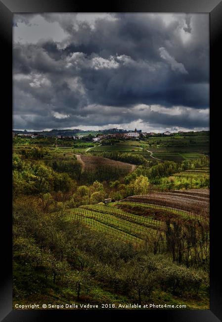The thunderstorm over the hills Framed Print by Sergio Delle Vedove