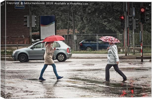 Two Umbrellas In The Crossing Canvas Print by Jukka Heinovirta