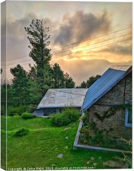 A Tilted Cottage Canvas Print by Zahra Majid