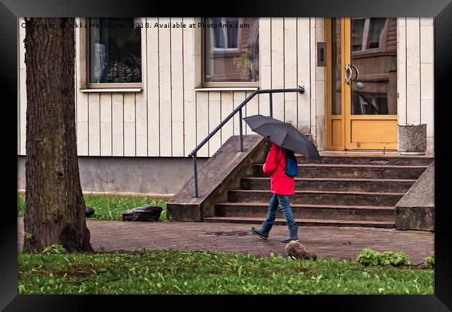 Walking With Umbrella Framed Print by Jukka Heinovirta