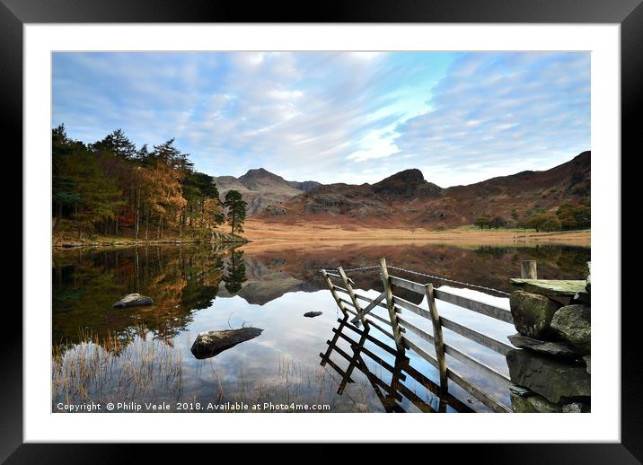 Blea Tarn's Dawn Reflection of Serenity. Framed Mounted Print by Philip Veale