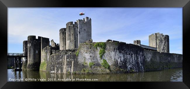 Caerphilly Castle Flying The Flag. Framed Print by Philip Veale