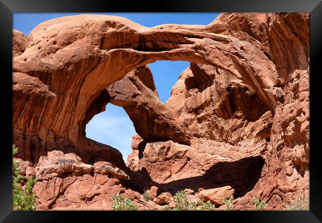 Double arch in Utah park during summer time  Framed Print by Thomas Baker