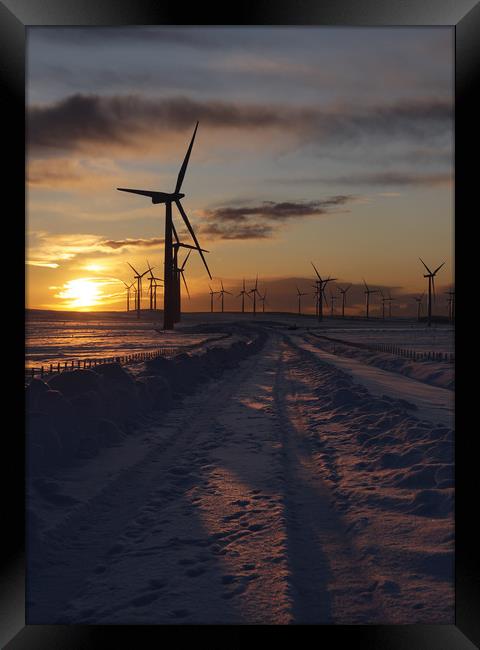 Windfarm sunset Framed Print by Robert McCristall