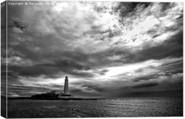 Dramatic early morning sky at St Mary's Island Canvas Print by Jim Jones