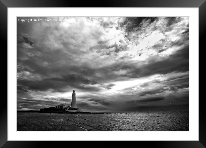 Dramatic early morning sky at St Mary's Island Framed Mounted Print by Jim Jones