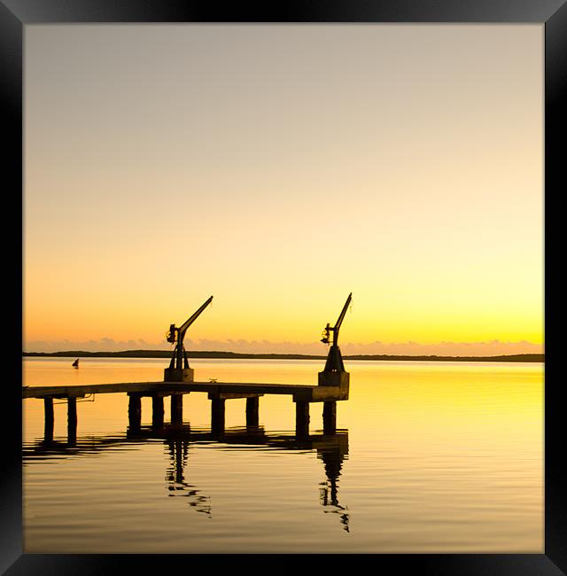 Sunrise at the boat dock Framed Print by Chris Thaxter