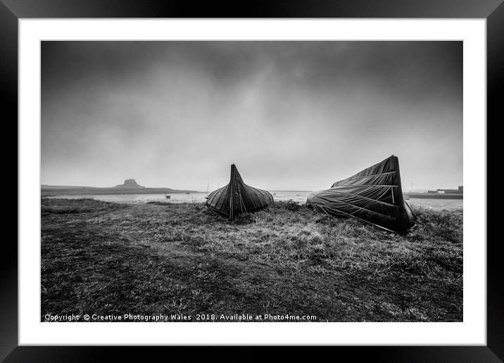 Upturned Boats at Lindisfarne Harbour Framed Mounted Print by Creative Photography Wales
