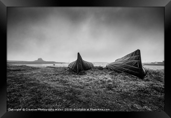 Upturned Boats at Lindisfarne Harbour Framed Print by Creative Photography Wales