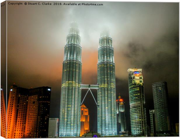 Up in the clouds, Kuala Lumpur Canvas Print by Stuart C Clarke