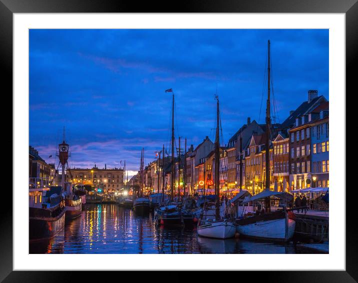 The old harbour area of Nyhavn in Copenhagen Framed Mounted Print by George Robertson