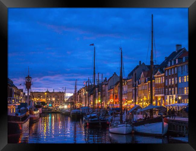 The old harbour area of Nyhavn in Copenhagen Framed Print by George Robertson