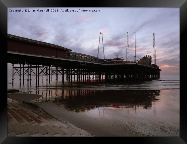 Sunset over South Pier  Framed Print by Lilian Marshall
