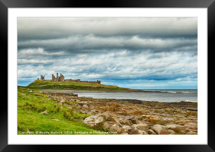Dunstanbrugh Castle No 2 on a blustery day  Framed Mounted Print by Angela Wallace