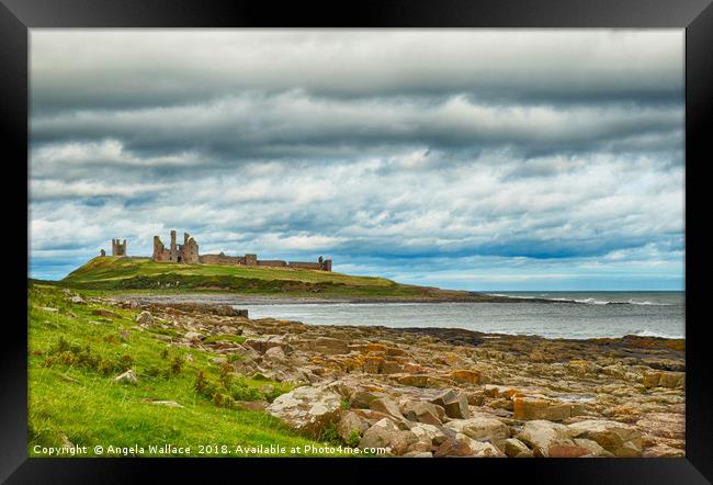 Dunstanbrugh Castle No 2 on a blustery day  Framed Print by Angela Wallace