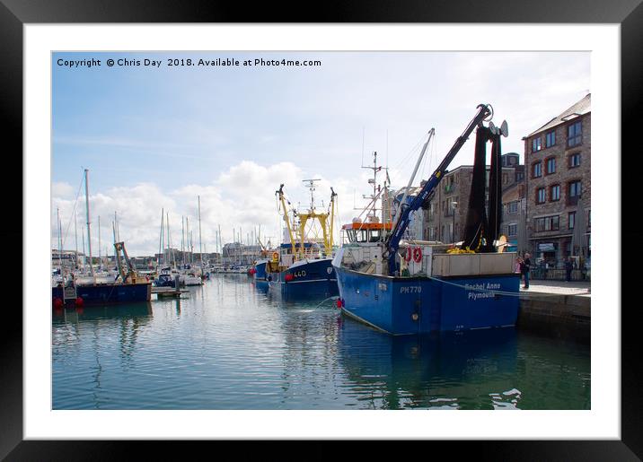 Fishing boats in Sutton Harbour Framed Mounted Print by Chris Day