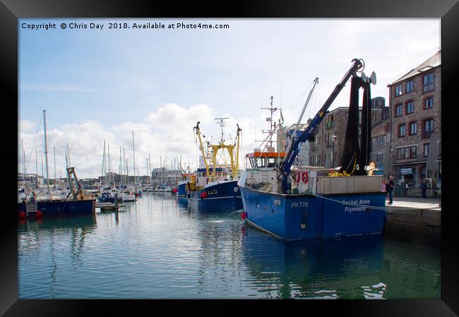 Fishing boats in Sutton Harbour Framed Print by Chris Day
