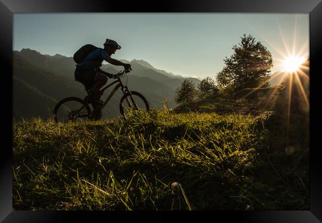 Mountain Biker at Sunset  Framed Print by Fabrizio Malisan