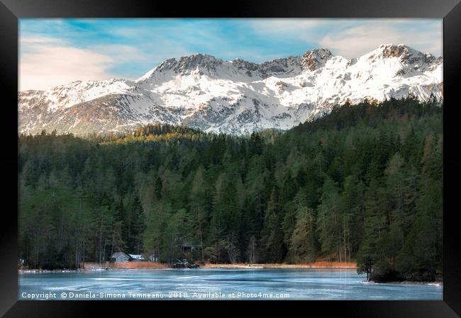 Snow-capped mountains and frozen lake Framed Print by Daniela Simona Temneanu