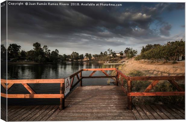Wooden jetty and gazebo over the lake in Sao Domin Canvas Print by Juan Ramón Ramos Rivero