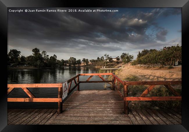Wooden jetty and gazebo over the lake in Sao Domin Framed Print by Juan Ramón Ramos Rivero
