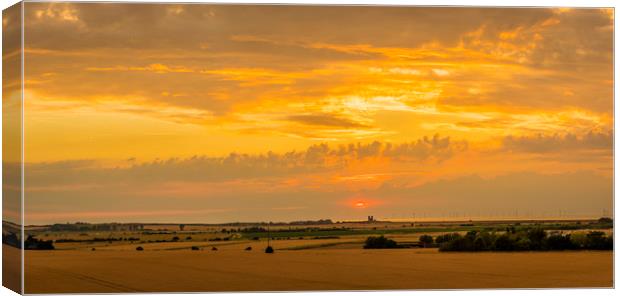 Sunset across the marshes to Reculver Towers Canvas Print by Robin Lee