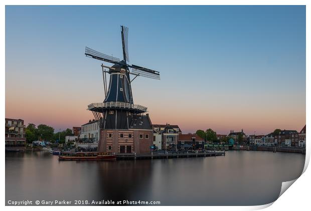 Dutch windmill, in the town of Haarlem, at sunset. Print by Gary Parker