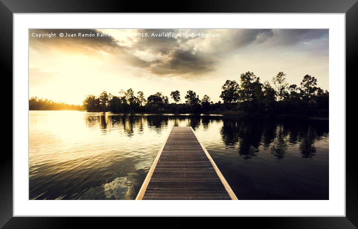 Wooden jetty over the lake with reflections Framed Mounted Print by Juan Ramón Ramos Rivero