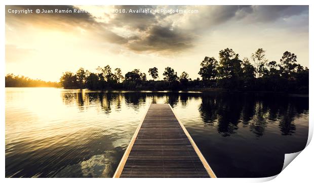 Wooden jetty over the lake with reflections Print by Juan Ramón Ramos Rivero