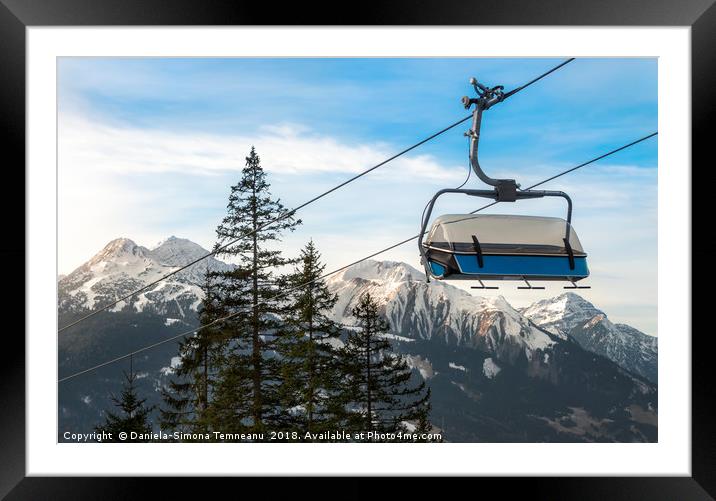 Ski chairlift  and Alps mountains peaks Framed Mounted Print by Daniela Simona Temneanu