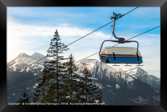 Ski chairlift  and Alps mountains peaks Framed Print by Daniela Simona Temneanu