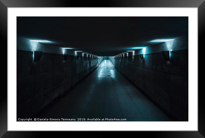 Underground passage with blue light Framed Mounted Print by Daniela Simona Temneanu
