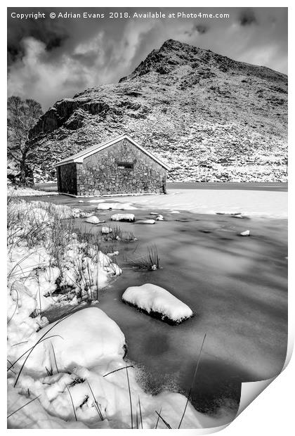 Frrozen Lake Snowdonia  Print by Adrian Evans