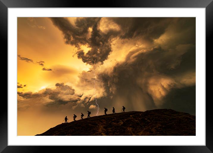 Hikers on the storm Framed Mounted Print by John Finney