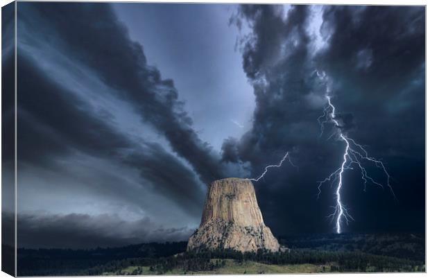 Storm over The Devils Tower Canvas Print by John Finney